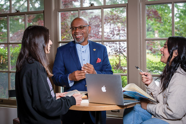 Miles K. Davis talking to students.