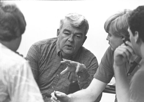 Jim Duke speaking to three Linfield students back in the late 1960s.