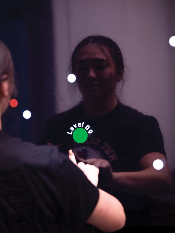 Student using lab equipment.