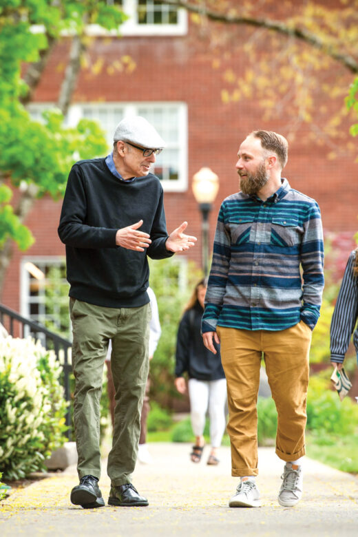Rabbi Mel Young and Rev. Jeremy Richards in conversation walking through campus.