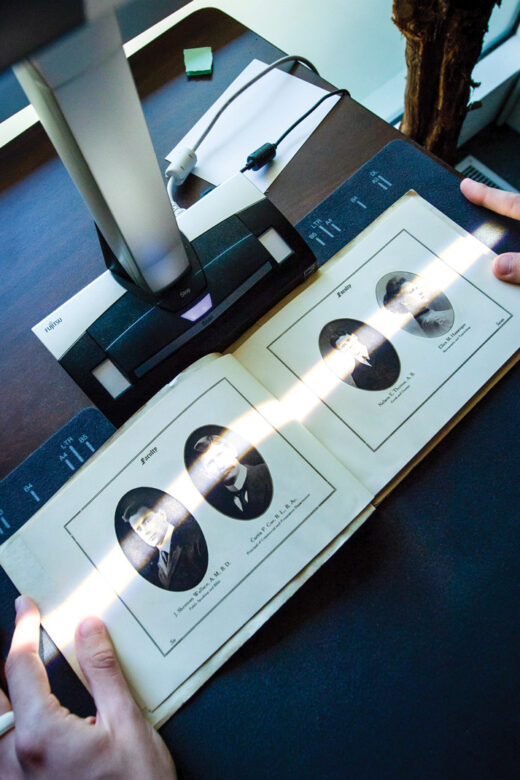 Students scanning Linfield's collection of yearbooks.