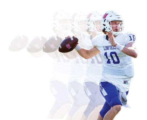Wildcat football player throwing a pass.