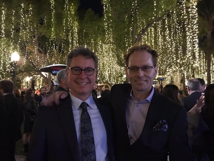 Bill Campbell and Skye Fitzgerald pose at a formal event