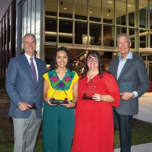 All four award winners posing for a photo.