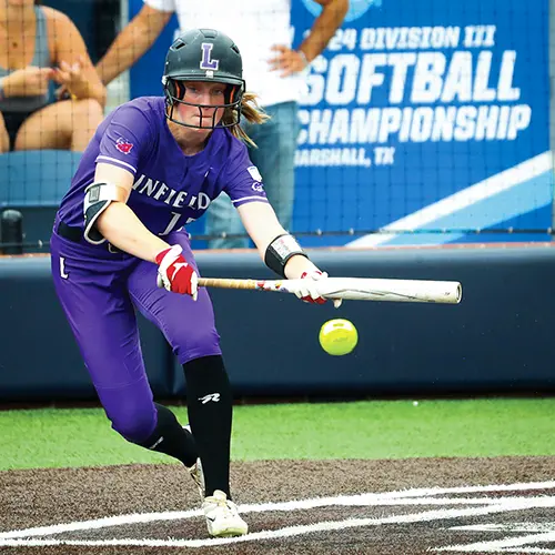 Kaili bunting during a softball game.