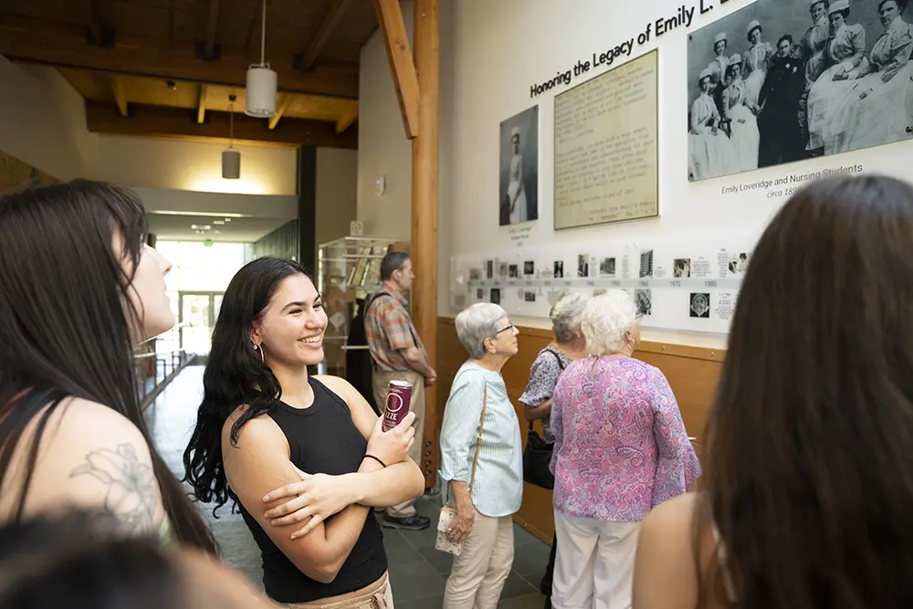 A group of attendees viewing the exhibit.