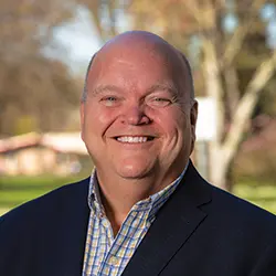 headshot of Dean Paul Smith.